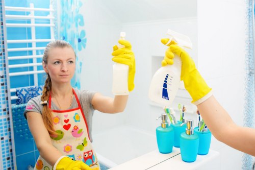 Cleaning dust and debris after renovation work in a Putney property
